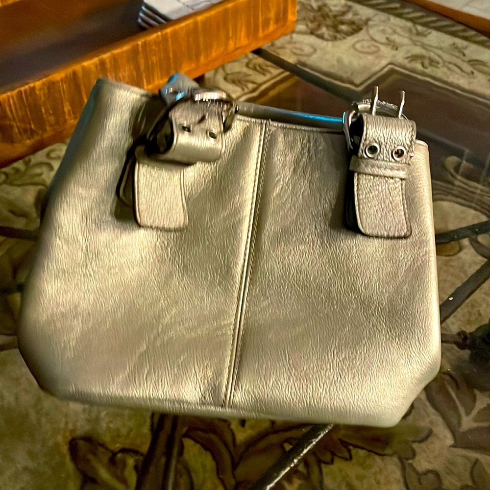 PERFECT….This is a beautiful tote bag perfect size ..silver leather bag